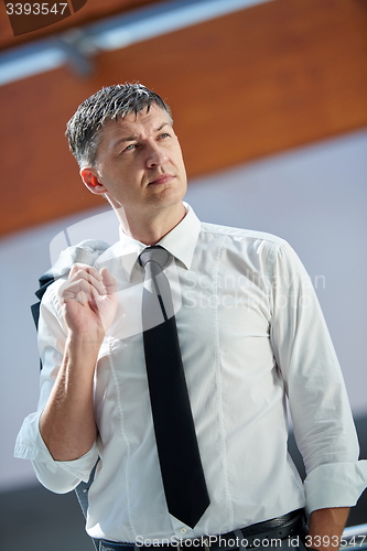 Image of business man using phone