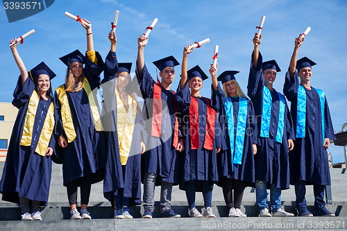 Image of young graduates students group