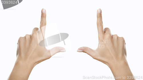 Image of Hands showing frame