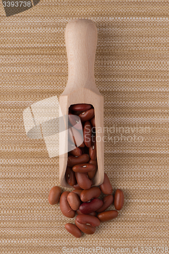 Image of Wooden scoop with red beans