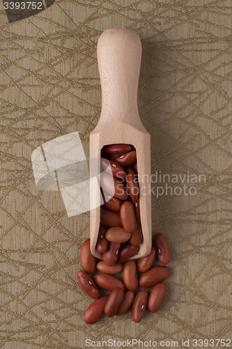 Image of Wooden scoop with red beans
