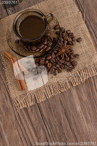 Image of Coffee cup with burlap sack