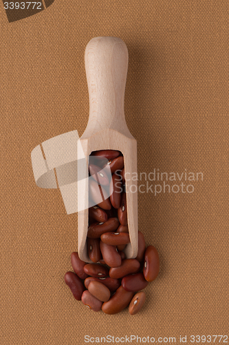 Image of Wooden scoop with red beans