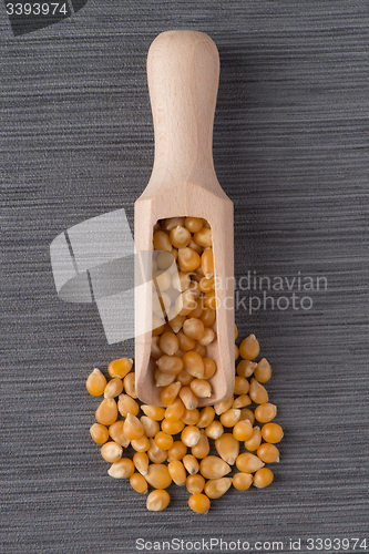 Image of Wooden scoop with corn