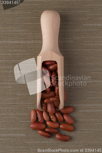 Image of Wooden scoop with red beans