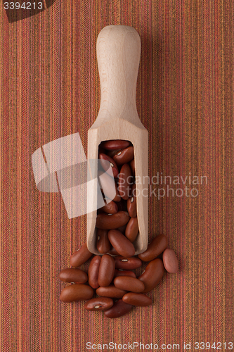 Image of Wooden scoop with red beans