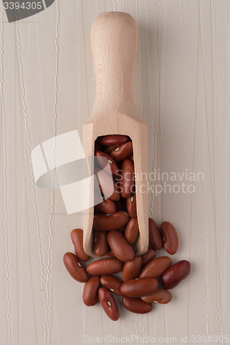 Image of Wooden scoop with red beans