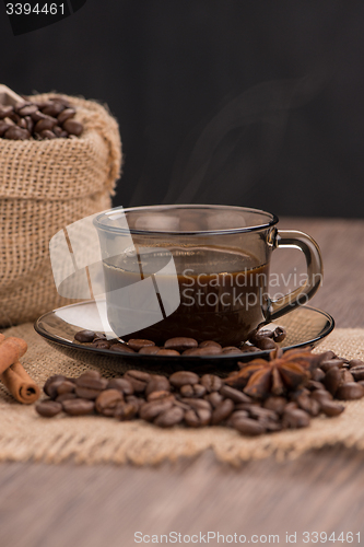 Image of Coffee cup with burlap sack