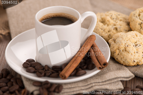 Image of Coffee cup with burlap sack