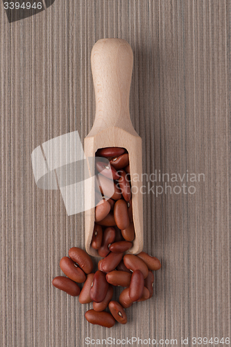 Image of Wooden scoop with red beans