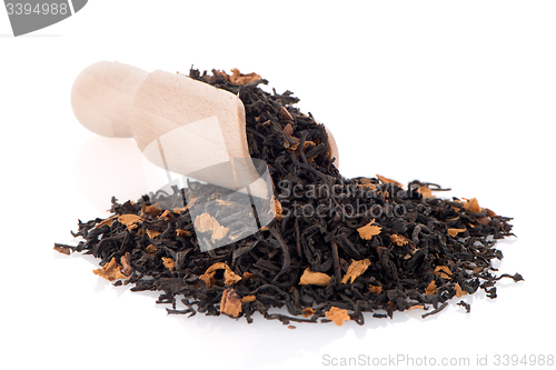 Image of Black Dry Tea with a Wooden Spoon