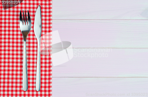 Image of Kitchenware on red towel