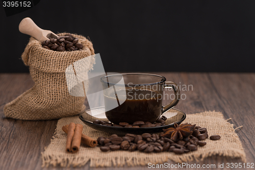 Image of Coffee cup with burlap sack