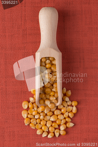 Image of Wooden scoop with corn