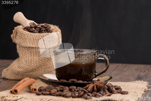 Image of Coffee cup with burlap sack