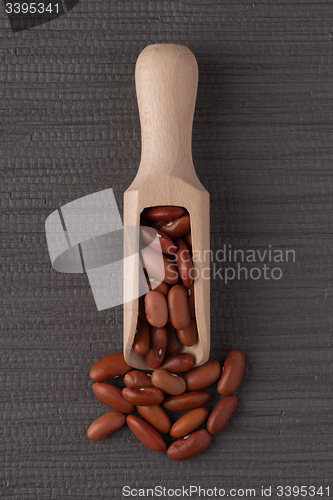 Image of Wooden scoop with red beans