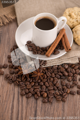 Image of Coffee cup with burlap sack