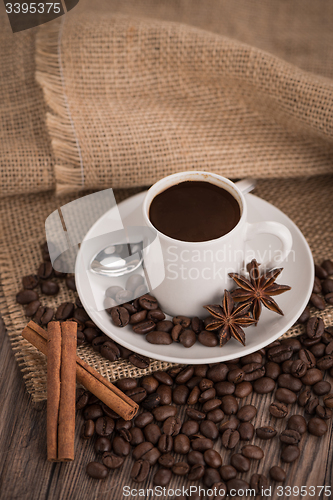 Image of Coffee cup with burlap sack