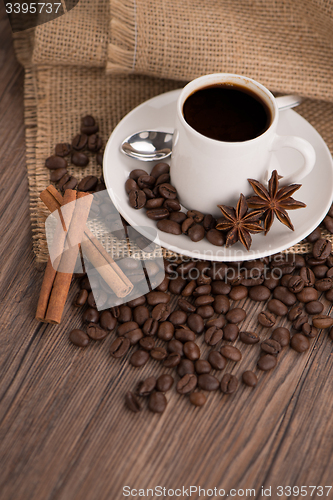 Image of Coffee cup with burlap sack