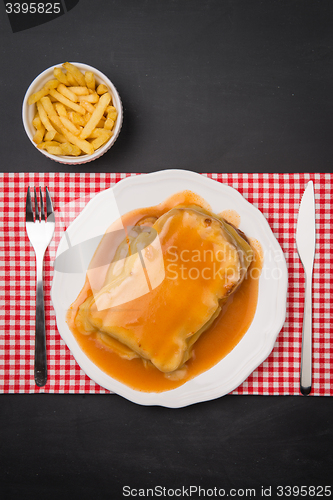 Image of Francesinha and french fries