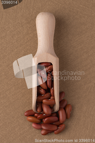 Image of Wooden scoop with red beans