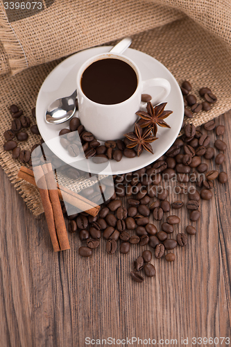 Image of Coffee cup with burlap sack