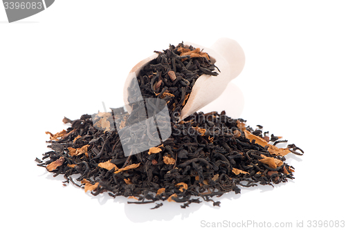 Image of Black Dry Tea with a Wooden Spoon