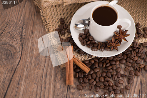 Image of Coffee cup with burlap sack