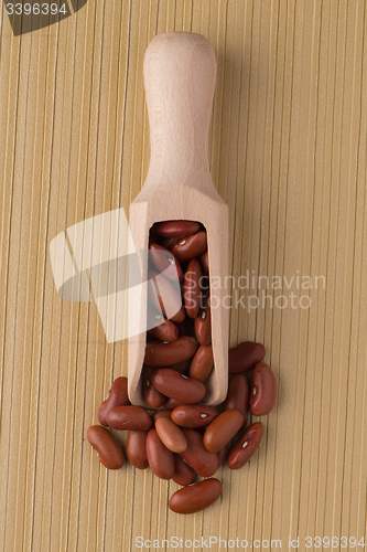 Image of Wooden scoop with red beans