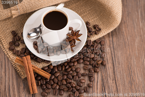 Image of Coffee cup with burlap sack