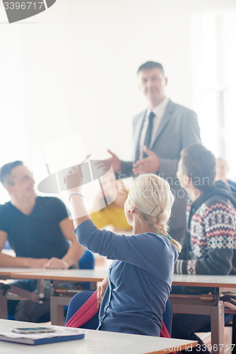 Image of group of students with teacher on class