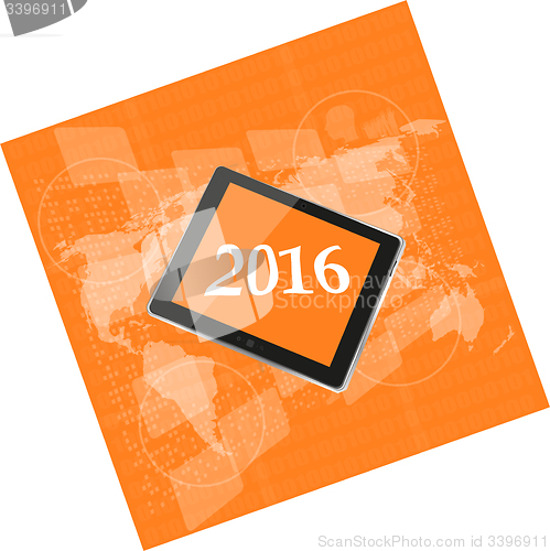 Image of tablet pc or smart phone on business digital touch screen, world map, happy new year 2016 concept