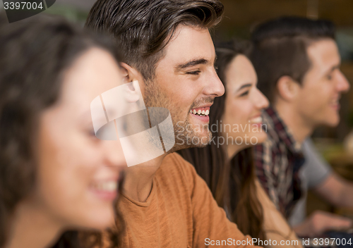 Image of Friends having fun at the restaurant