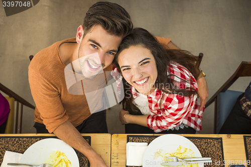 Image of Young couple at the restaurant