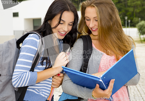 Image of Two beautiful teenage students