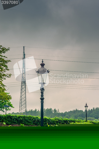 Image of Vintage lamp in cloudy weather