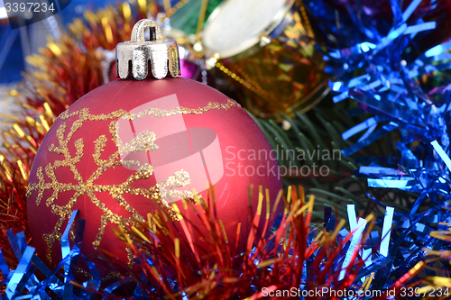 Image of Christmas border with ornament, red present and snow
