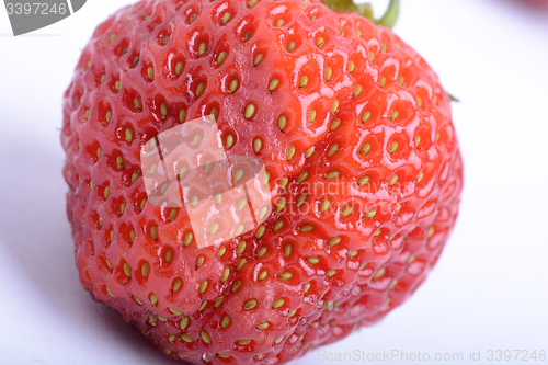 Image of fresh strawberries close up isolated on a white background