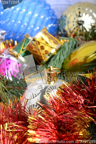 Image of Christmas tree branch with decoration ball, new year holiday card