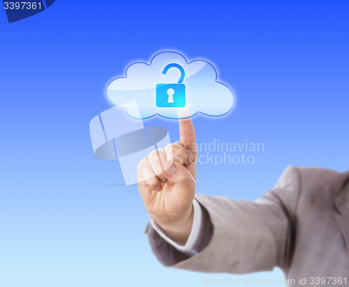 Image of Arm Reaching To Touch Open Lock Icon In Cloud