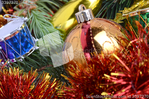 Image of Christmas baubles on christmas tree. new year invitation card