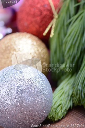 Image of Christmas tree branch with ball