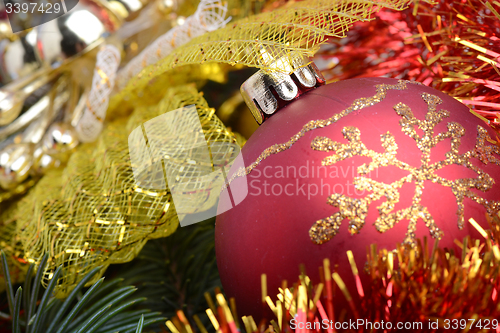 Image of Christmas border with ornament, red present and snow