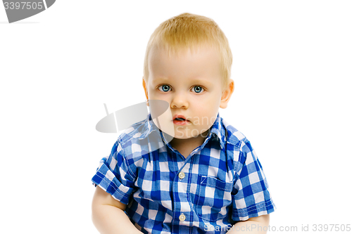 Image of boy sitting on a white background