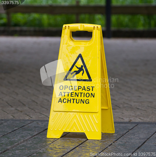 Image of Watch your step sign on the floor