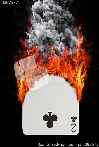 Image of Playing card with fire and smoke