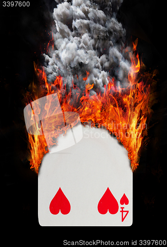 Image of Playing card with fire and smoke