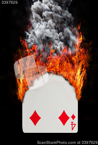 Image of Playing card with fire and smoke