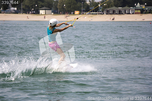 Image of Young girl wakeboarder