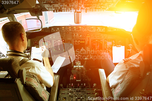 Image of Pilots Working in an Aircraft 